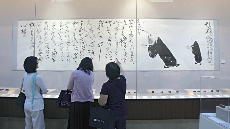 李蕭錕2011年作〈小沙彌〉，12×8厘米。