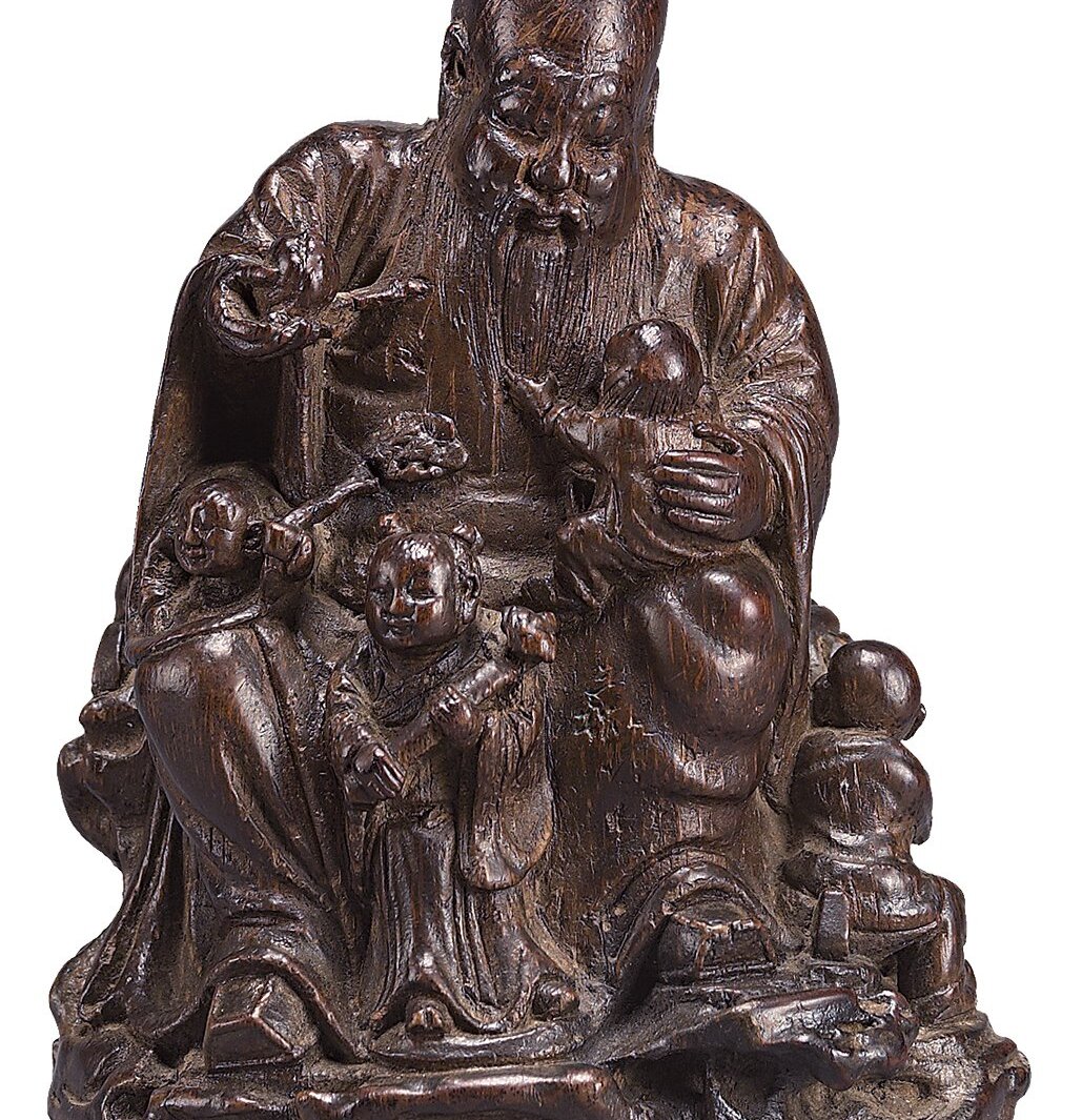 清代朱稚征〈竹根雕多子壽星〉,「三松」款,鴻禧美術館藏。