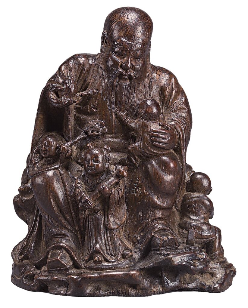 清代朱稚征〈竹根雕多子壽星〉,「三松」款,鴻禧美術館藏。