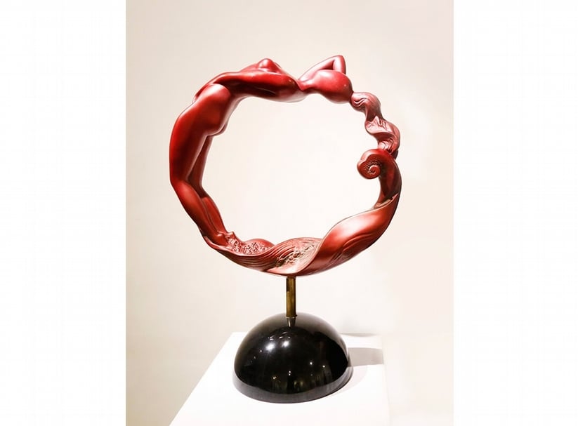 簡志達，潮水，銅、花崗岩，58x25x81cm，2000。