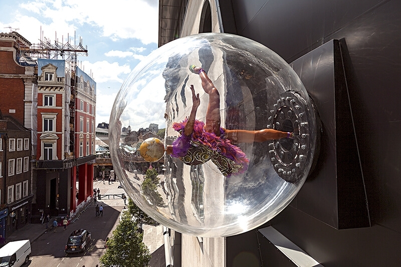 Globe Head Ballerina Date: 2012Dimensions: 200 x 200 cmMedium: Fibreglass mannequin, Dutch wax printed cotton textile, tutu, acrylic globe, rotor, globe and pointe shoesPhotographer credit, image courtesy: Courtesy the artist Royal Opera House, Londo