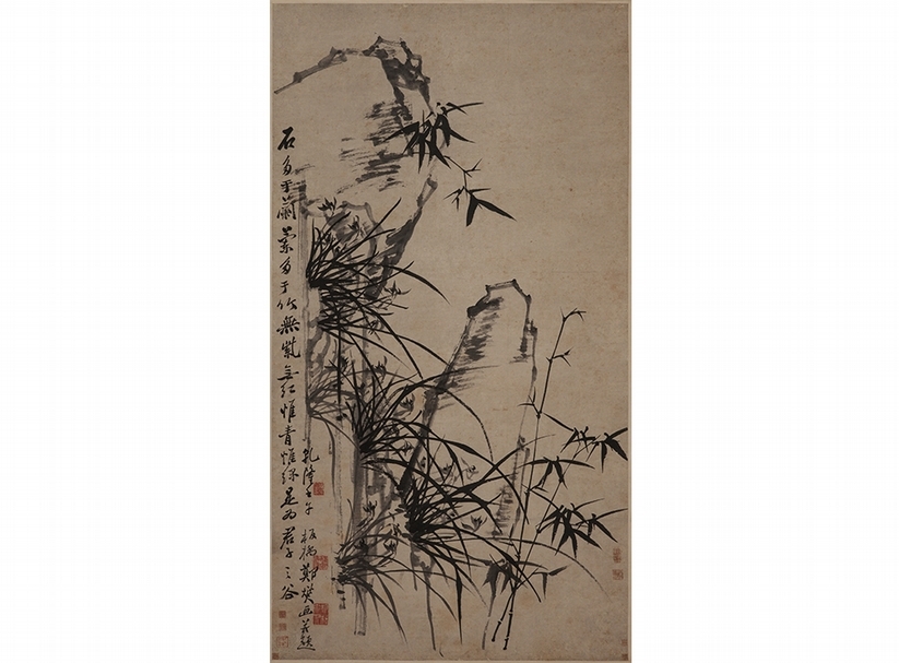 鄭板橋〈墨竹蘭石圖〉。