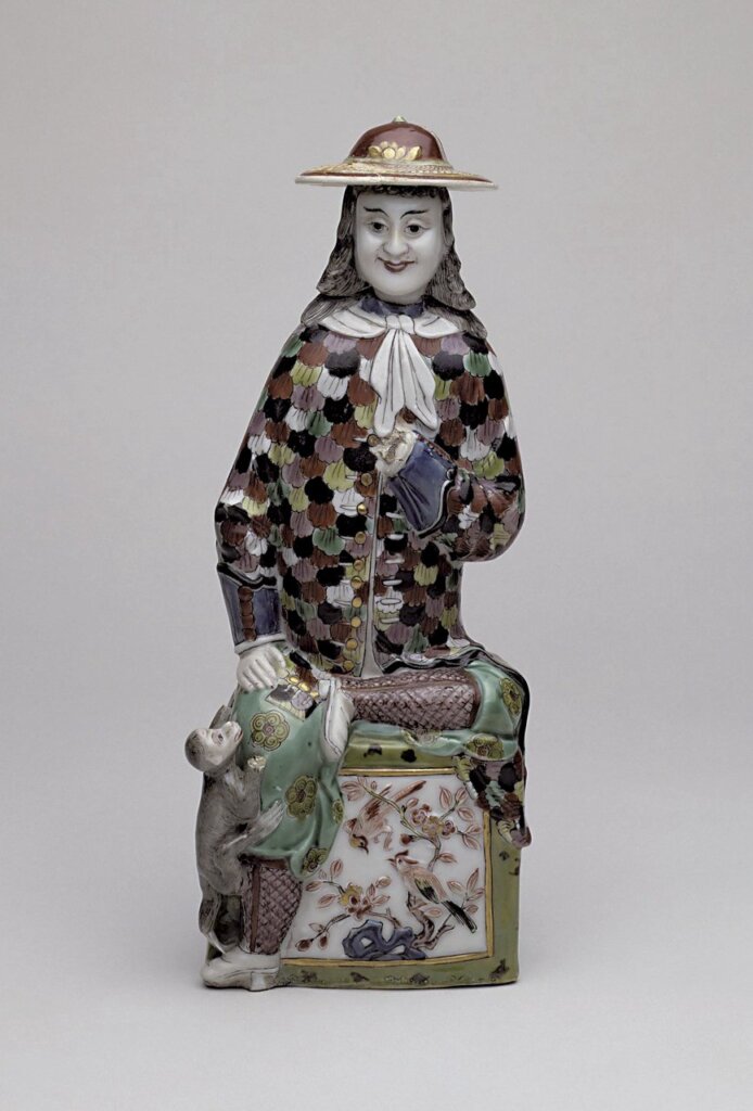 約1700年〈荷商與猴〉，德化瓷體、荷蘭繪製，C.17-1951。
