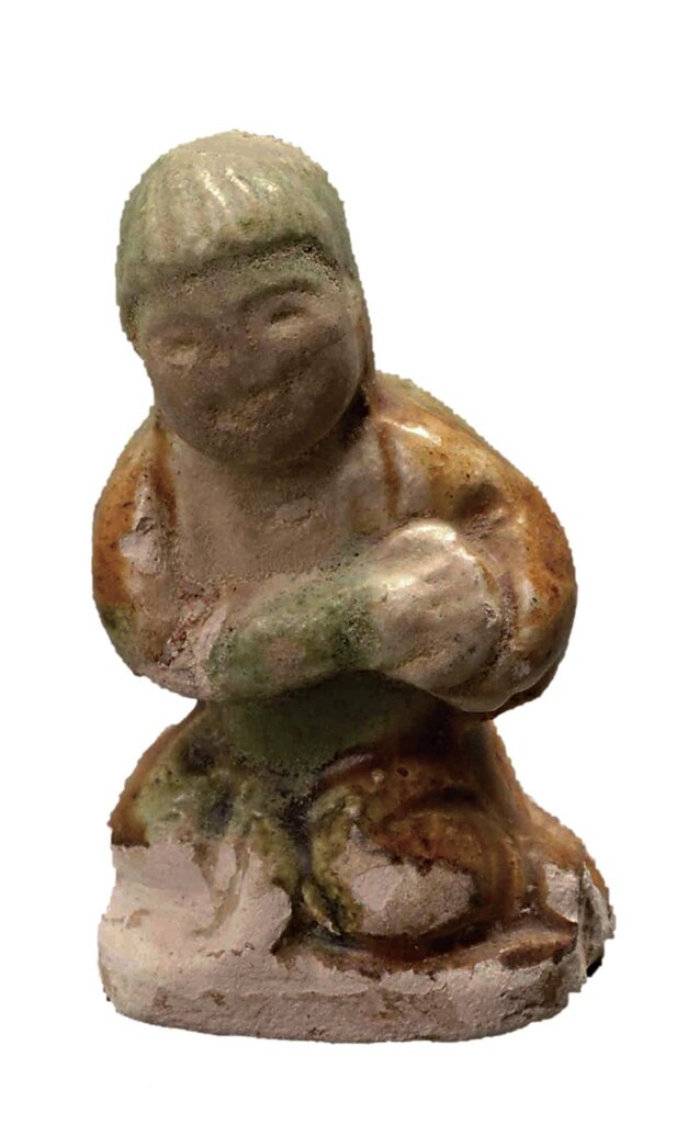 〈抱腰鼓俑〉。