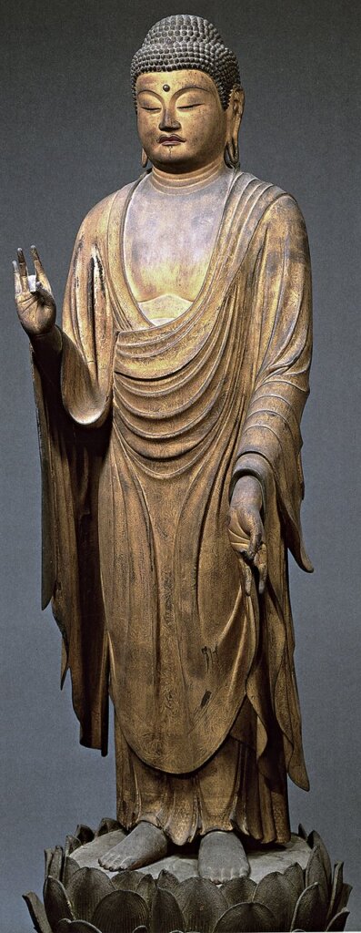 快慶約1194～1199年〈阿彌陀佛像〉，寄木刨空造，彩漆，貼金箔，鑲玉眼，高98.9公分。現存遣迎院，京都，日本重要文化財。圖版出處：《Portraits of Chōgen：The Transformation of Buddhist Art in Early Medieval Japan》，pl.108。