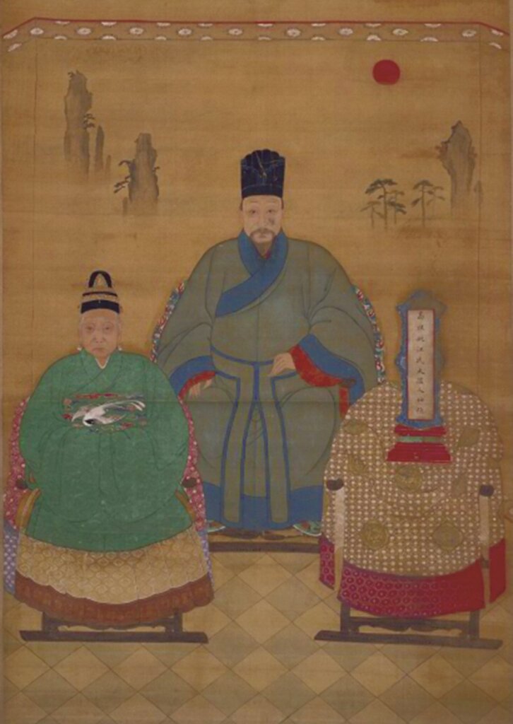 明人〈畫男女像軸〉，北京故宮藏。編號新99475。