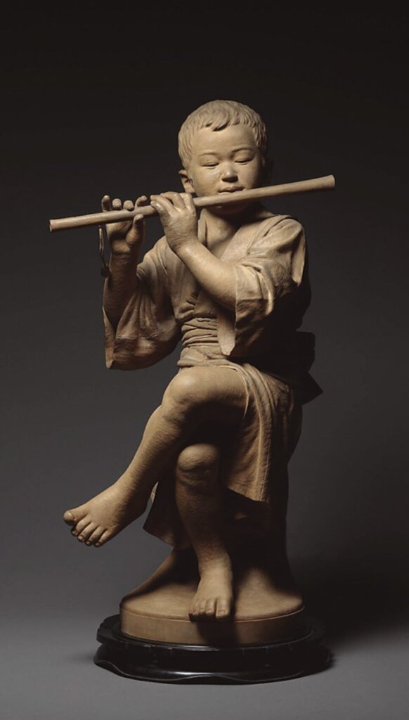 荒川嶺雲（1868～1941）櫻木雕〈笛吹童子〉，台灣50美術館。