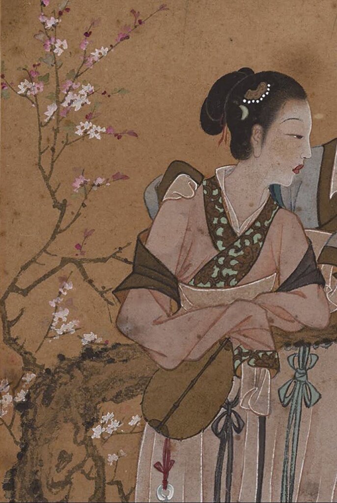 侍女的手肘部位的黴斑修復前後對比。