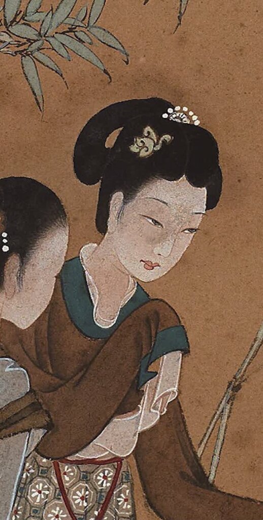 仕女臉部的水漬痕跡修復前後對比。