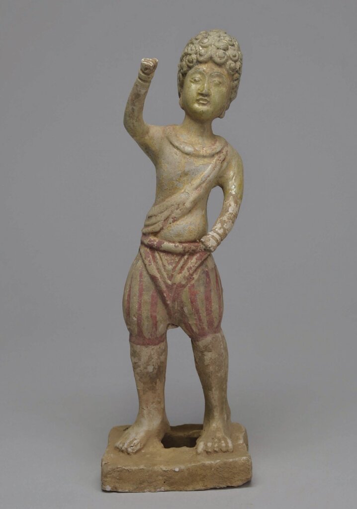 唐7世紀〈黃釉加彩捲髮俑〉 高29公分，日本大阪市立東洋陶磁美術館藏（海野信義寄贈）