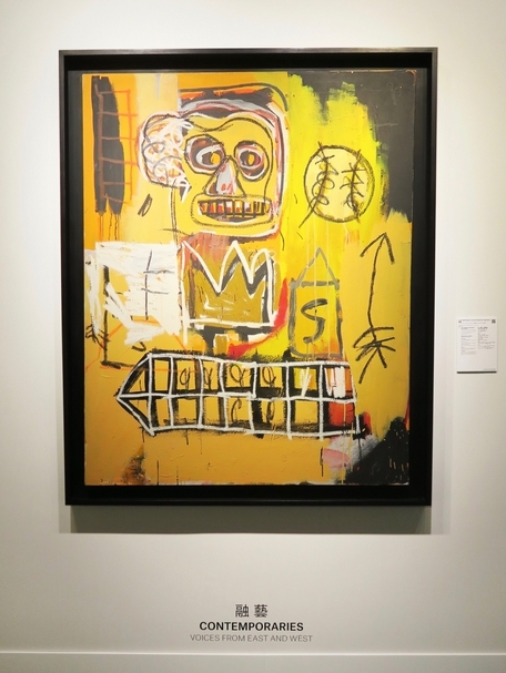 尚．米榭．巴斯奇亞（Jean-Michel Basquiat）《無題（橘色運動人像）》成交價達7,322萬5千港元，排名夜場第四高價，亦為「融藝」專場最價昂之作。（攝影／楊椀茹）