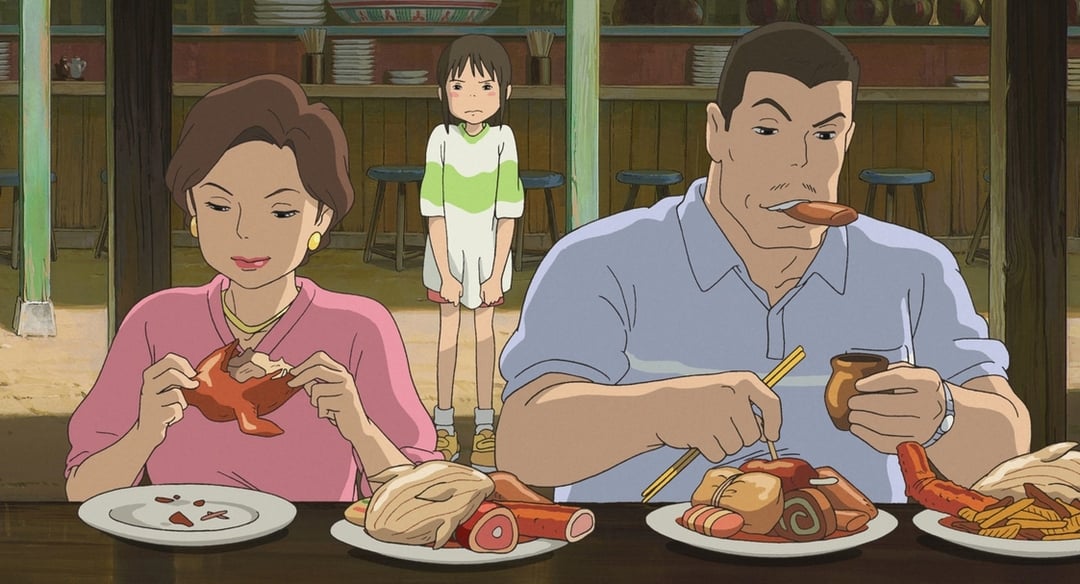 《神隱少女》千尋的爸媽自顧自地吃起東西。© 2001 Studio Ghibli・NDDTM