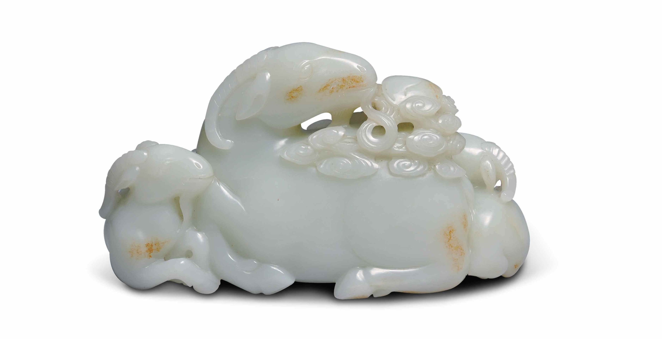 清乾隆〈白玉帶皮三羊開泰擺件〉。（潘文華提供）