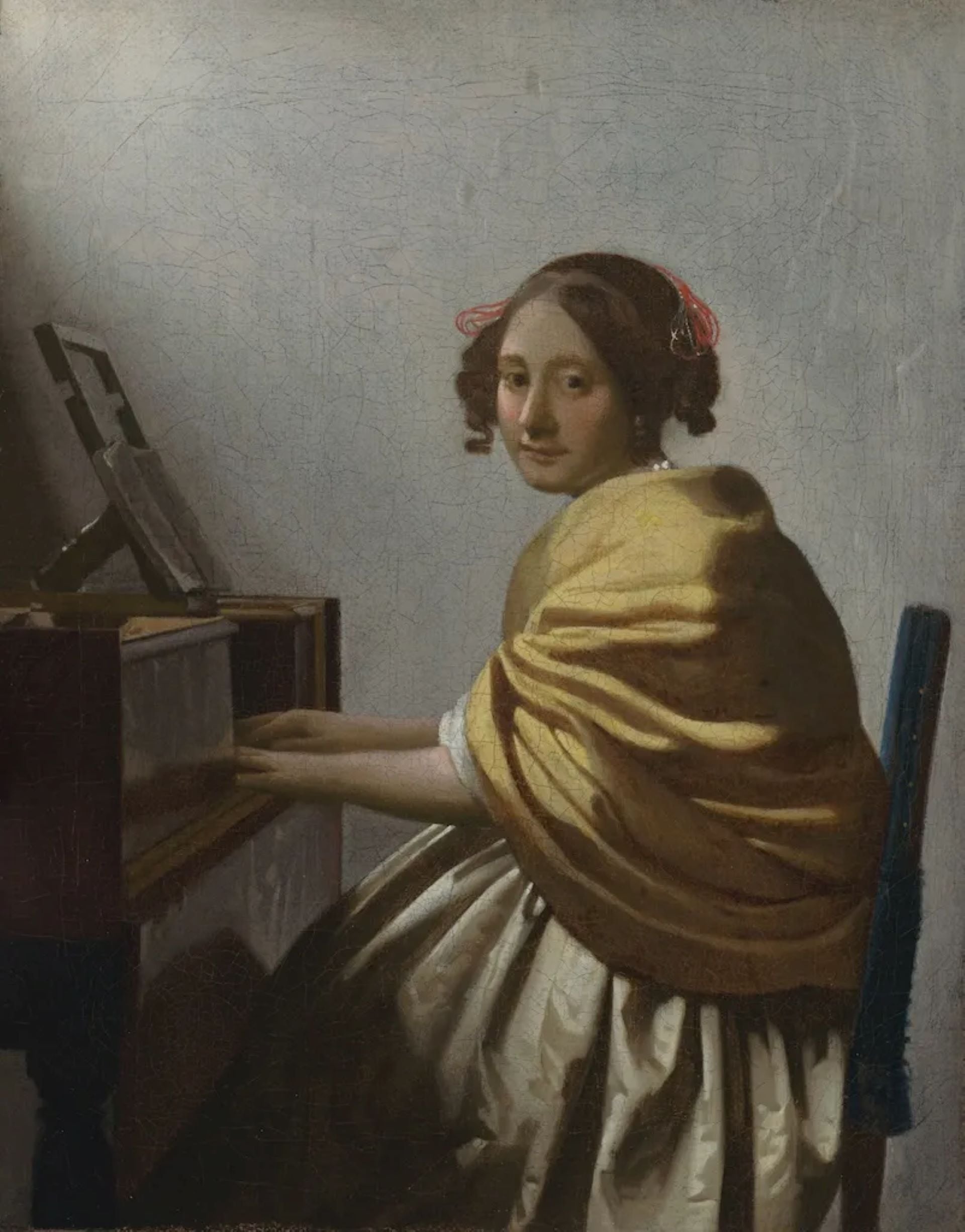 約翰內斯．維米爾 （Johannes Vermeer），《坐在維金納琴前的年輕女子》（Young Woman Seated at a Virginal），約 1672-75。（©The Leiden Collection）