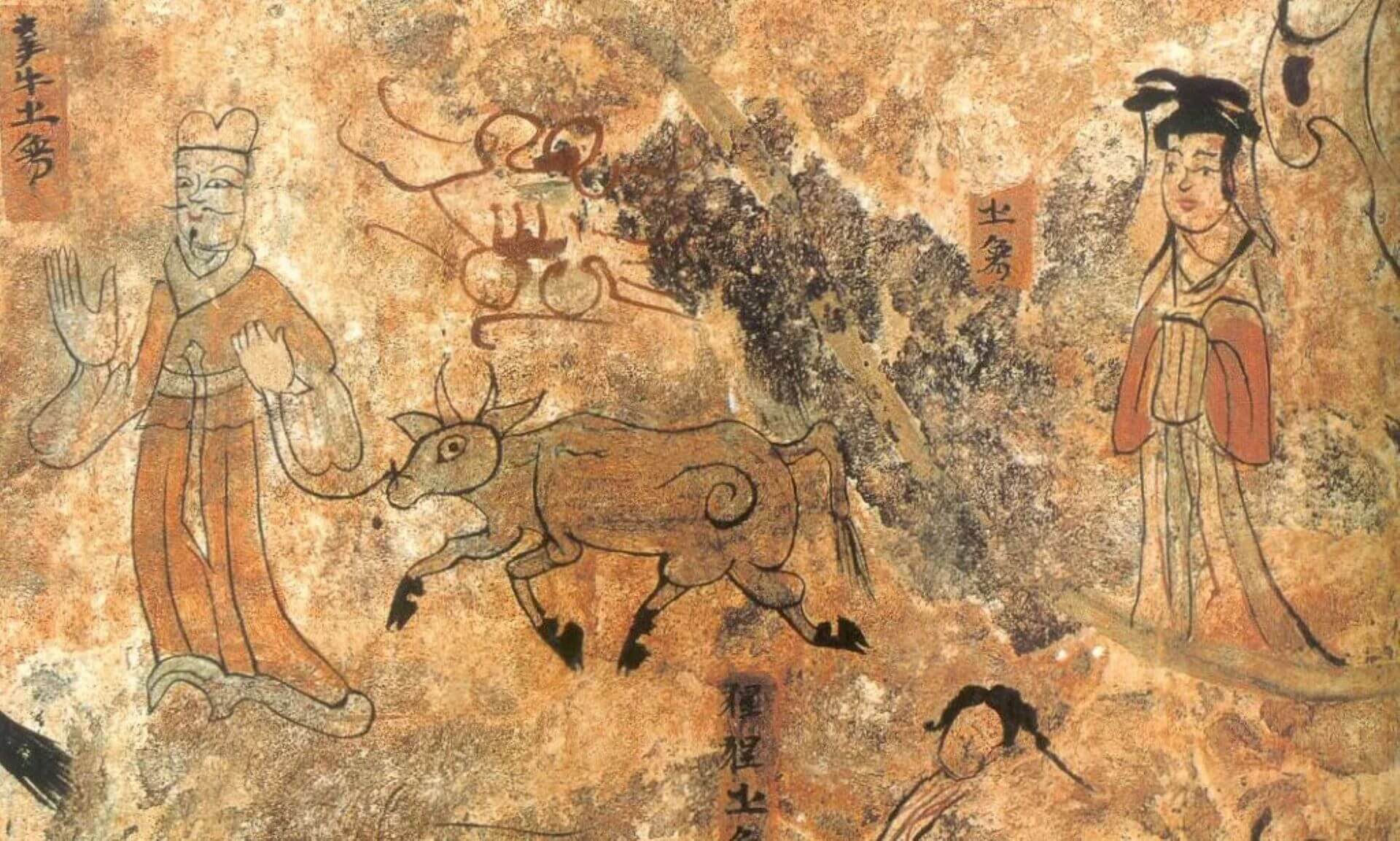 高句麗德興里壁畫墓，約公元408年，描繪了牛郎織女一年一度重逢後即將離別的場景，為韓國最古老、最具代表性的牛郎織女圖像。牛郎旁邊的題字為「牽牛之象」。（維基百科）