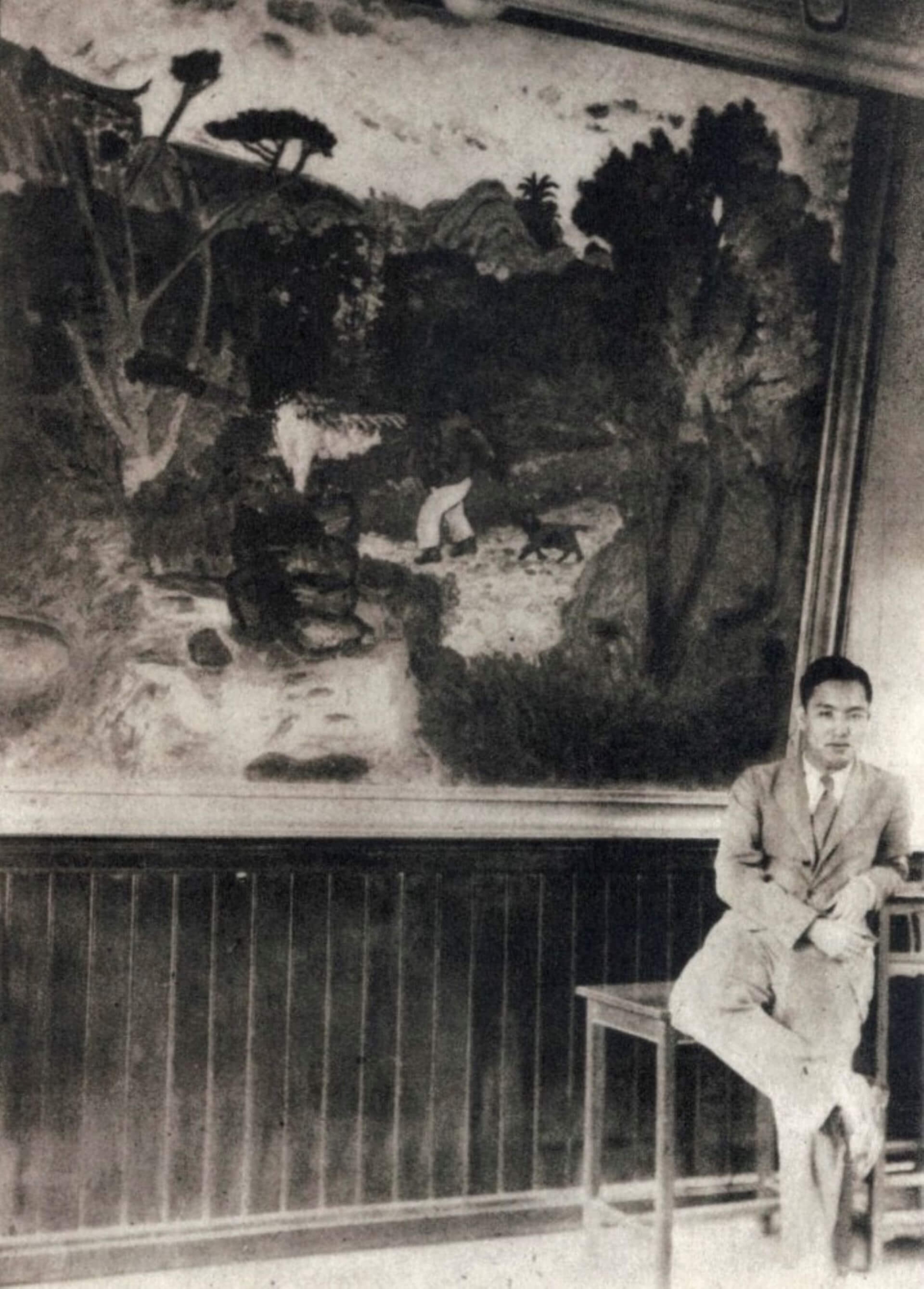 陳清汾與二科展出品作〈榕園〉合影。（《臺日畫報》，1934-10-15）