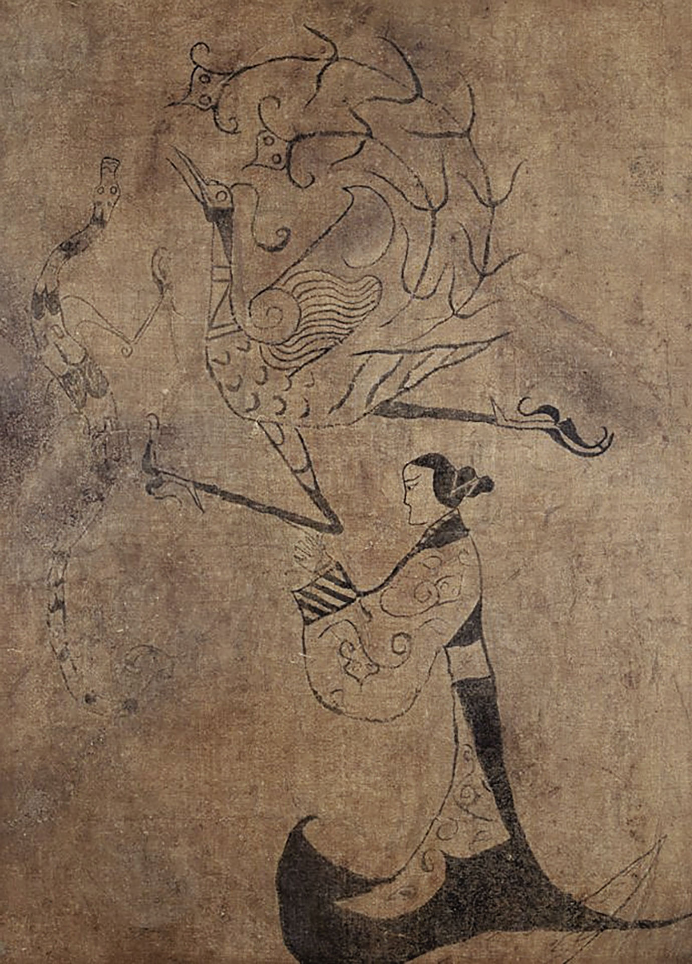 戰國《人物龍鳳帛畫》中的女子被認為是溝通人神世界的巫女或巫祝，是楚國盛行巫祀文化（信鬼好祠）的代表，此帛畫本身即葬儀用的引魂幡（可視為物質媒介），旨在引領墓主人的靈魂藉由龍鳳指引升天，湖南省博物館藏。（Public Domain）
