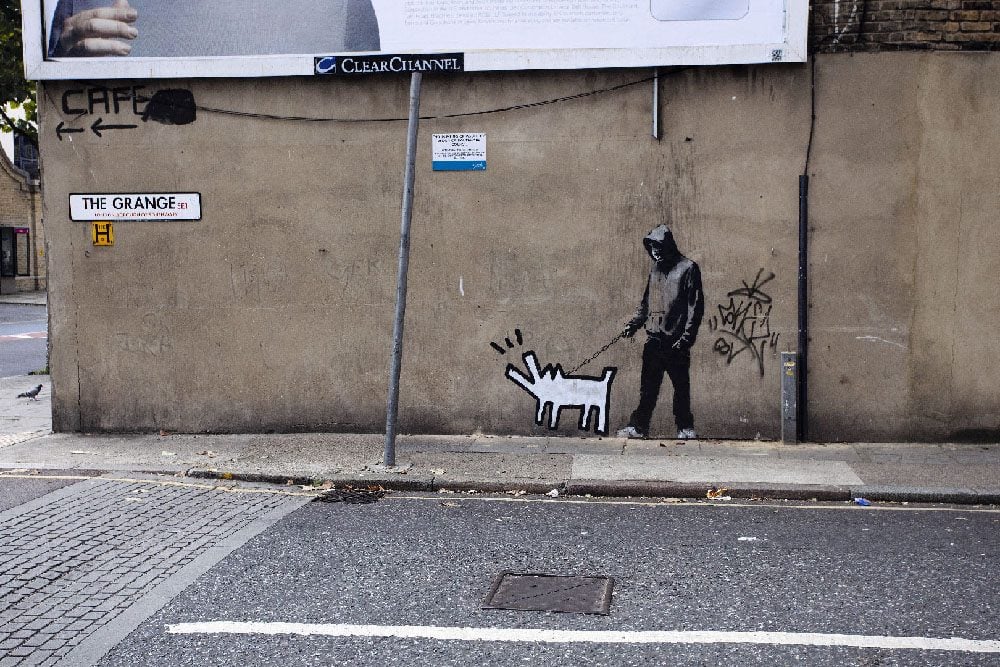 Editorial use only Mandatory Credit: Photo by Shutterstock (1235918b) Graffiti by Banksy on a wall in Bermondsey, London…