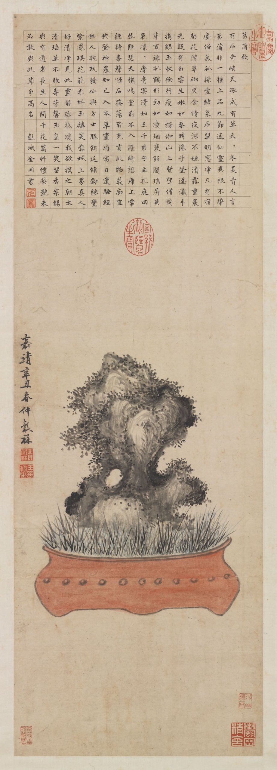 明代王穀祥〈盤石菖蒲〉，84.2 × 28.5公分。國立故宮博物院提供。